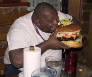 East 6 Fat-guy-eating-giant-hamburger